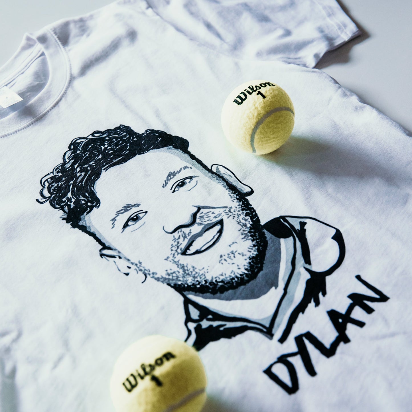 Dylan Alcott T-shirt by High Tees. Ethically made in Melbourne from 100% GOTS organic cotton. 10% donated to West Welcome Wagon. ©High Tees