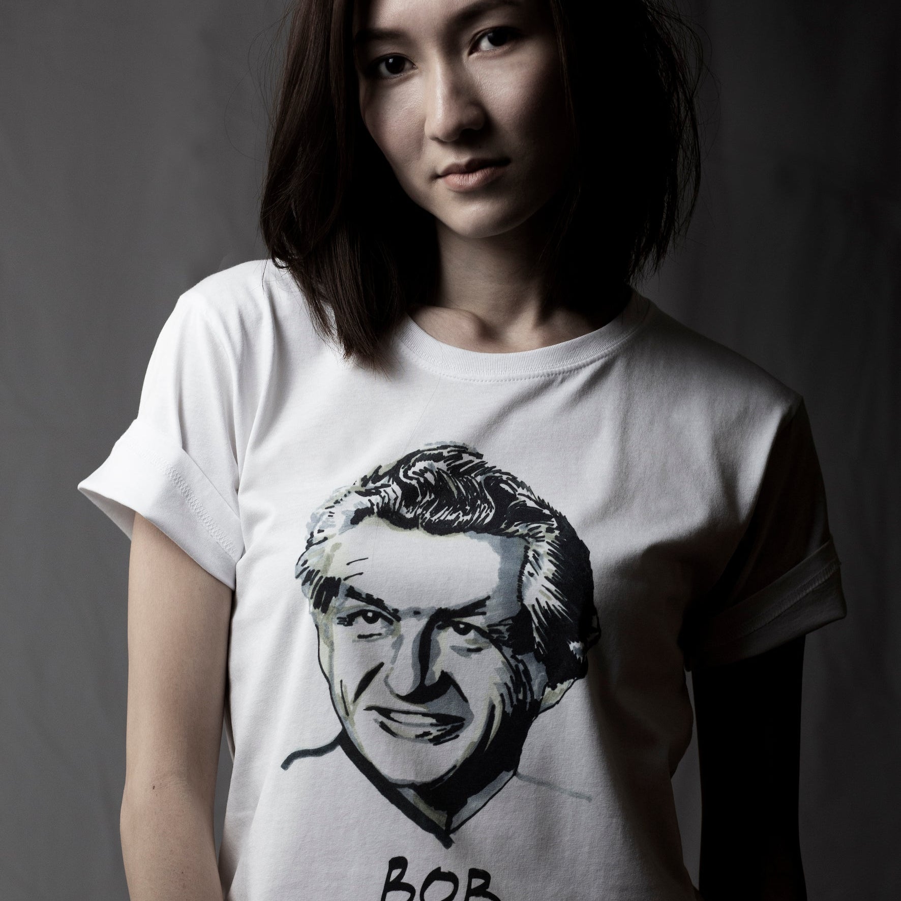 Women wearing the High Tees Bob Hawke T shirt, 100% organic cotton unisex t shirt. Ethically sourced. Designed and printed in Melbourne, Australia. 